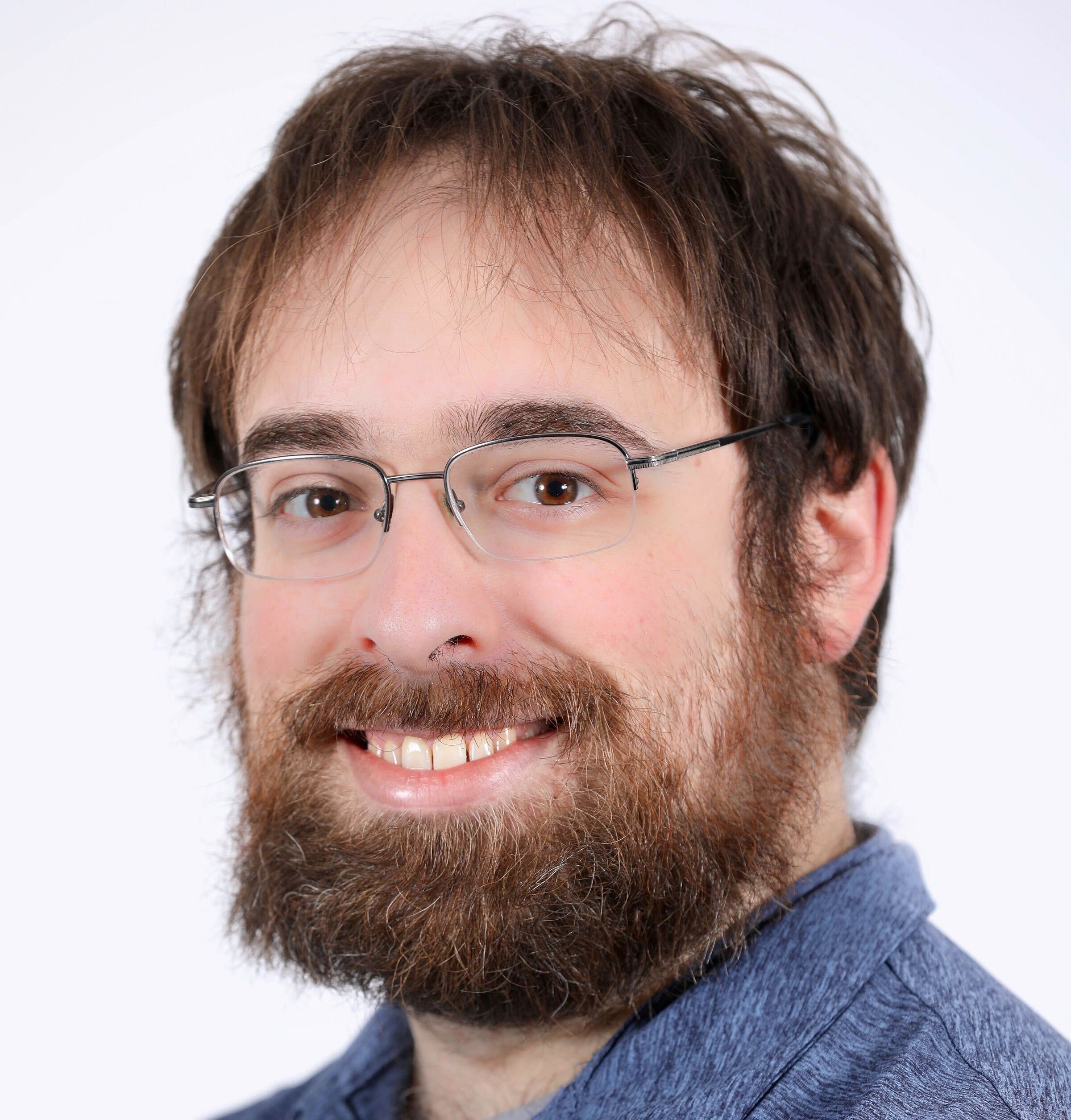 A headshot of Mike Solomon